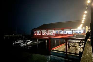 Rocker oysterfeller's restaurant right on the pier on a foggy night